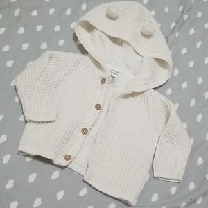 Knitted, hooded sweater